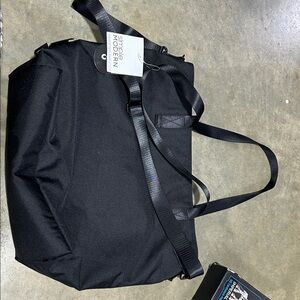 Modern Black Messenger Bag by Side of Modern
